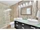 Modern bathroom showcasing a double vanity with vessel sinks, a frameless glass shower, and stylish tile work at 1212 Anime Dr, Las Vegas, NV 89144