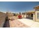 Spacious backyard with brick patio and potential for landscaping at 1301 Nugget Creek Dr, Las Vegas, NV 89108
