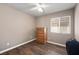 Simple bedroom with wood laminate flooring and window for natural light at 1301 Nugget Creek Dr, Las Vegas, NV 89108