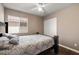 Comfortable bedroom features a cozy bed, window, and closet for ample storage at 1301 Nugget Creek Dr, Las Vegas, NV 89108