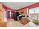 Well-equipped kitchen featuring wooden cabinets, granite counters and modern appliances at 1301 Nugget Creek Dr, Las Vegas, NV 89108