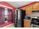 Bright kitchen boasts stainless steel appliances and tiled backsplash at 1301 Nugget Creek Dr, Las Vegas, NV 89108