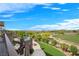 Expansive backyard with meticulously landscaped yard, fire pit, pool and golf course views at 1472 Macdonald Ranch Dr, Henderson, NV 89012
