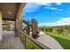 Modern exterior features stone accents, manicured landscaping, and inviting outdoor space, stairs to the next level at 1472 Macdonald Ranch Dr, Henderson, NV 89012