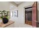 Hallway view with elevator access and tasteful decor at 1472 Macdonald Ranch Dr, Henderson, NV 89012