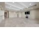 Expansive living area with recessed lights, neutral walls, and tile flooring for flexible living and entertaining at 1472 Macdonald Ranch Dr, Henderson, NV 89012