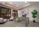 Office including a desk, shelving unit, and comfortable seating at 1472 Macdonald Ranch Dr, Henderson, NV 89012