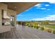 Outdoor kitchen area boasting stainless steel appliances and scenic golf course views at 1472 Macdonald Ranch Dr, Henderson, NV 89012