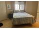 Cozy bedroom featuring a plush bed near a window, and wood floors at 1851 Hillpointe Rd # 2621, Henderson, NV 89074
