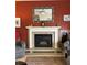 Inviting living room with a cozy fireplace and decorative mantle at 1851 Hillpointe Rd # 2621, Henderson, NV 89074