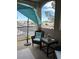 Relaxing patio with comfortable seating and a calming view of the surrounding landscape at 1851 Hillpointe Rd # 2621, Henderson, NV 89074