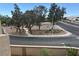 Picturesque view of the street, landscaping, and nearby residences, showcasing the neighborhood's charm at 1851 Hillpointe Rd # 2621, Henderson, NV 89074