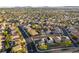 Scenic aerial shot of a planned residential community with tree-lined streets and mountain views at 2434 Amoretti St, Henderson, NV 89052