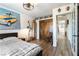 Cozy bedroom features modern decor with a view to the hallway at 2434 Amoretti St, Henderson, NV 89052