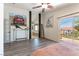 Bedroom with balcony access and an en-suite bathroom with a soaking tub at 2434 Amoretti St, Henderson, NV 89052