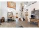Elegant foyer with staircase, wood floors, high ceilings, and stylish decor at 2434 Amoretti St, Henderson, NV 89052