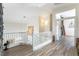 Upstairs hallway with hardwood floors and natural light at 2434 Amoretti St, Henderson, NV 89052