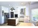 Bright kitchen with stainless appliances, wooden island and modern decor at 2434 Amoretti St, Henderson, NV 89052