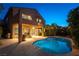 Backyard featuring a refreshing pool and inviting patio with a balcony, perfect for relaxing and entertaining at 2434 Amoretti St, Henderson, NV 89052
