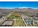 Comprehensive aerial view showcases sports fields, tennis courts, playgrounds, and residential area at 2579 Speyburn Ave, Henderson, NV 89044