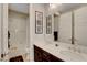 Bathroom featuring dual sinks and a shower-tub combo at 2579 Speyburn Ave, Henderson, NV 89044