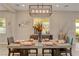 Dining area featuring modern light fixture and decorative accents at 2579 Speyburn Ave, Henderson, NV 89044