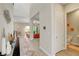 Bright foyer with an open floor plan, tile floors, and access to the living area at 2579 Speyburn Ave, Henderson, NV 89044