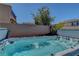 Inviting hot tub with clear blue water and multiple jets, offering a luxurious and relaxing experience at 2579 Speyburn Ave, Henderson, NV 89044