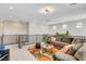 Bright and airy loft space with a comfortable seating area and plenty of room for activities at 2579 Speyburn Ave, Henderson, NV 89044