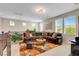 Cozy loft area with a comfortable sectional sofa, perfect for relaxing or entertaining guests at 2579 Speyburn Ave, Henderson, NV 89044