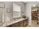 Spacious pantry with granite countertop, coffee bar, and custom shelving, perfect for organization and storage at 2579 Speyburn Ave, Henderson, NV 89044
