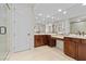 Bathroom with tile flooring, walk-in shower, and dual sink vanity at 2717 Mona Lisa St, Henderson, NV 89044