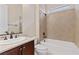 Bathroom featuring a single sink and shower/tub combo with tiled surround at 2717 Mona Lisa St, Henderson, NV 89044
