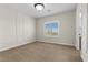 Bedroom with plush carpet flooring and window with shutter blinds at 2717 Mona Lisa St, Henderson, NV 89044