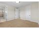Neutral bedroom featuring plush carpeting and bright white doors and trim at 2717 Mona Lisa St, Henderson, NV 89044