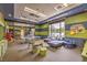Spacious rec room with ping pong, foosball table, seating, and lots of natural light at 2717 Mona Lisa St, Henderson, NV 89044