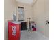 Finished storage area featuring a drink cooler, window and Red Bull at 2717 Mona Lisa St, Henderson, NV 89044
