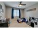 bedroom featuring a ceiling fan and blue accents at 2928 Sunday Silence Rd, North Las Vegas, NV 89086
