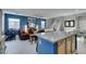 Spacious kitchen island overlooks the living area and staircase, offering an open floor plan at 2928 Sunday Silence Rd, North Las Vegas, NV 89086