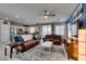 Open-concept living area with stylish decor, blending a modern kitchen and a cozy living space at 2928 Sunday Silence Rd, North Las Vegas, NV 89086