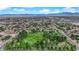 Aerial view showcasing a vibrant community park with mature trees and walking paths at 3065 S Torrey Pines Dr, Las Vegas, NV 89146