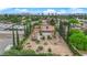 Aerial view of a sprawling property with a single-story home surrounded by mature trees and desert landscaping at 3065 S Torrey Pines Dr, Las Vegas, NV 89146