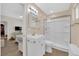 Updated bathroom featuring a tiled shower, modern vanity, and sleek fixtures at 3065 S Torrey Pines Dr, Las Vegas, NV 89146