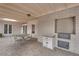 Charming covered patio with an outdoor dining area and built-in brick barbecue, ideal for entertaining at 3065 S Torrey Pines Dr, Las Vegas, NV 89146