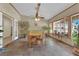 Dining room with tile floors, natural light, and decorative curtains at 3065 S Torrey Pines Dr, Las Vegas, NV 89146