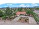 Stunning single-story home with a circular driveway, well-manicured landscaping, and mature trees at 3065 S Torrey Pines Dr, Las Vegas, NV 89146