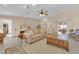 Comfortable living room with neutral tones, stylish furnishings, and tiled floors for a welcoming atmosphere at 3065 S Torrey Pines Dr, Las Vegas, NV 89146