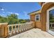 Balcony with great views of mature trees and neighboring homes on a sunny day at 3198 Stella Cilento Ave, Henderson, NV 89044