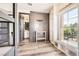 Charming bedroom featuring built-in bookshelves, a window seat, and wood-look flooring, offering a cozy retreat at 3198 Stella Cilento Ave, Henderson, NV 89044