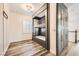 Cozy bedroom with custom built-in bunk beds, shuttered window, and ample storage cabinets along the hallway at 3198 Stella Cilento Ave, Henderson, NV 89044